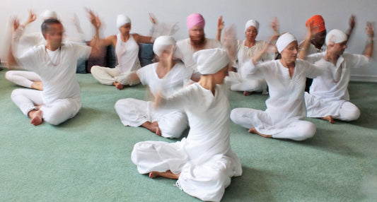 Kundalini yogis wearing white hearwear
