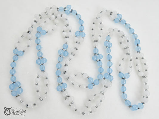 Aquamarine and white jade Tantric Mala with hematite spacers, displayed on a plain white background. A watermark for 'Kundalini Whites' is visible in the bottom-left corner.