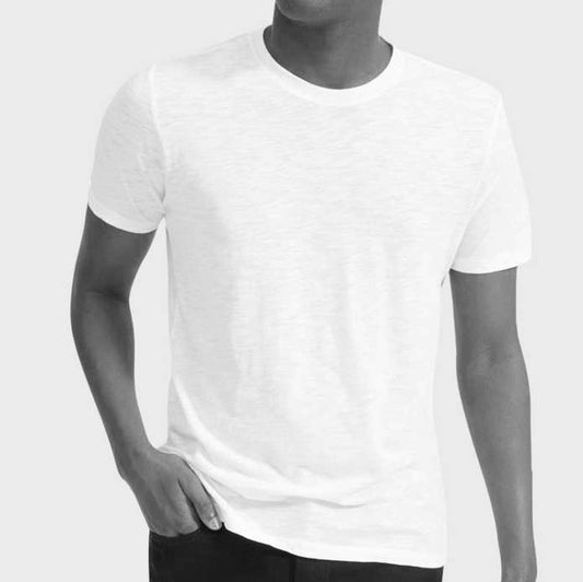Person wearing a plain white t-shirt on a light gray background