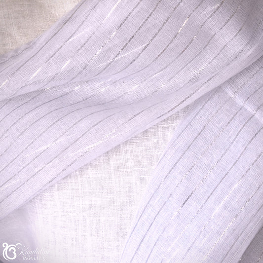 Close-up of lilac fabric with subtle texture on a light background