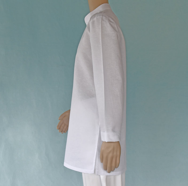 Mannequin wearing a long white shirt against a plain background