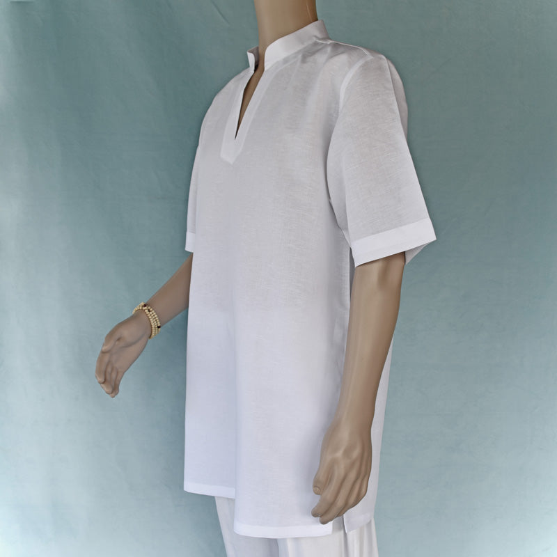 Mannequin wearing a white short-sleeve shirt against a light blue background