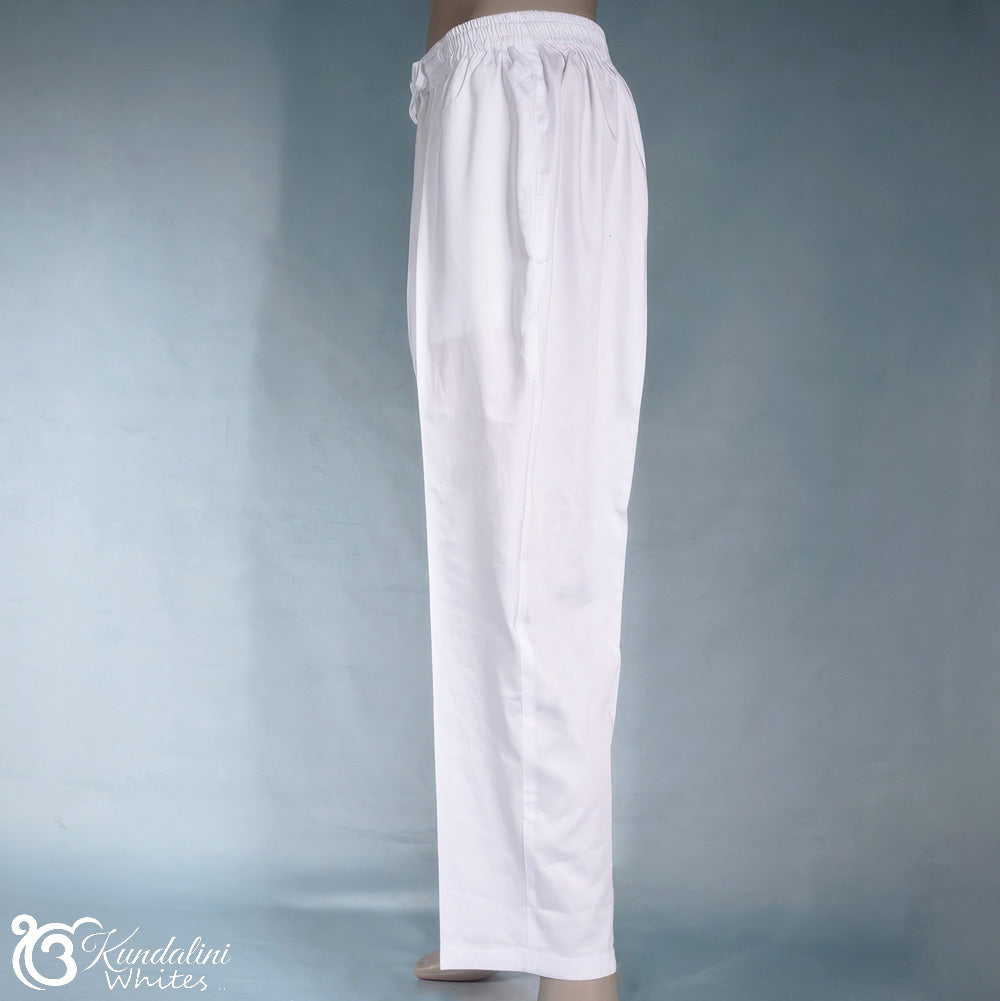White pants on a person against a gray background with 'Kundalini Whites' branding.