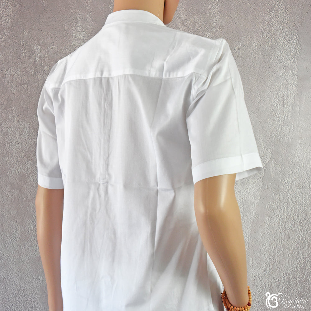 White shirt on a mannequin against a textured gray background