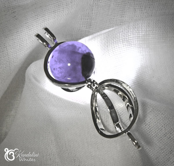 Spiral locket with amethyst
