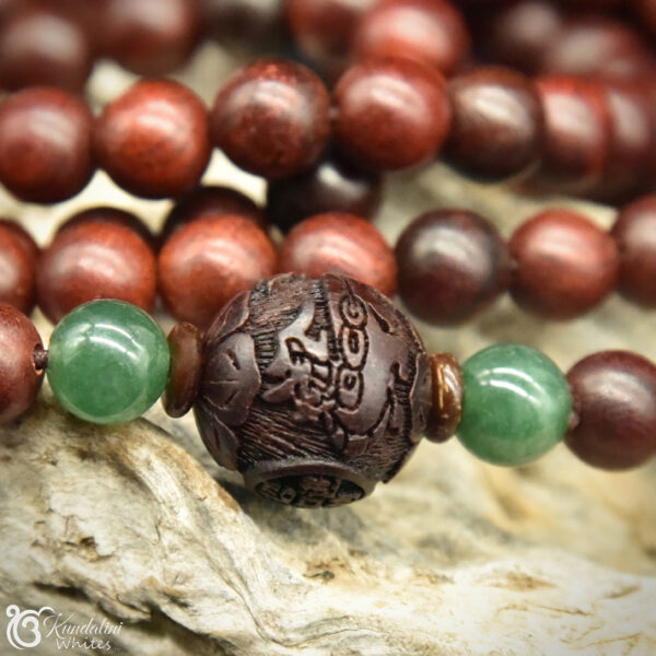 Sandalwood and green jade adorned mala in sandalwood